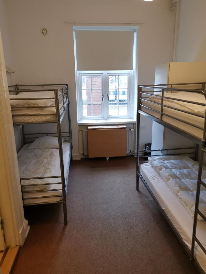 Danhostel Odense City المظهر الخارجي الصورة A typical hostel room