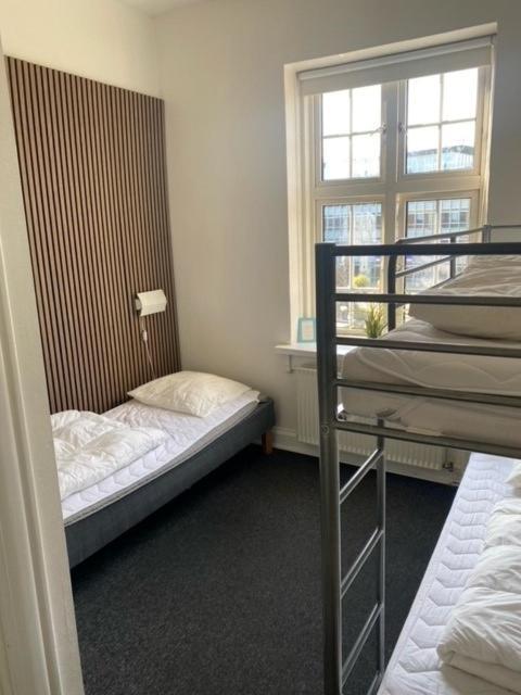 Danhostel Odense City المظهر الخارجي الصورة A typical room at the hostel