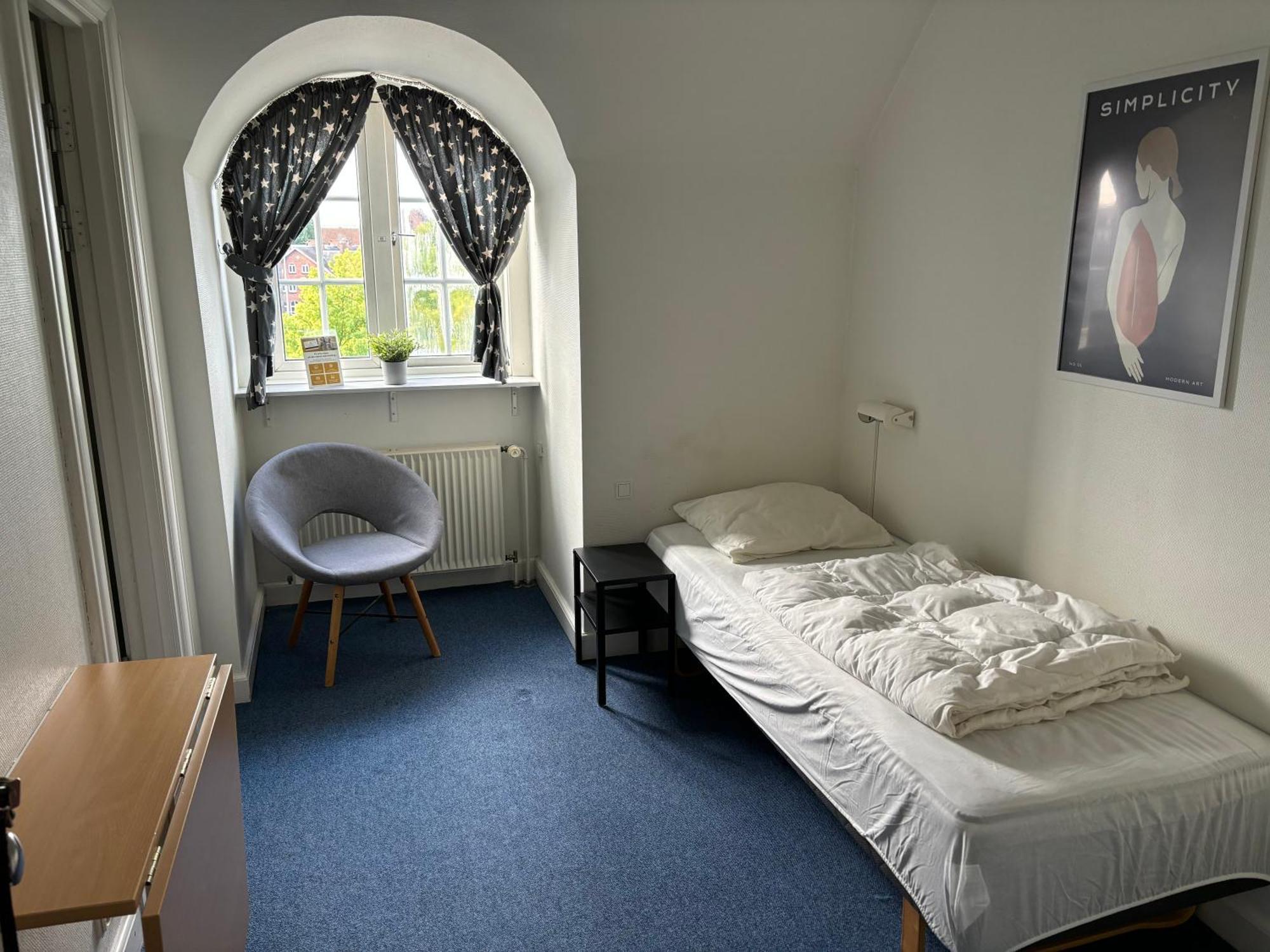 Danhostel Odense City المظهر الخارجي الصورة A room at the Internationales Haus
