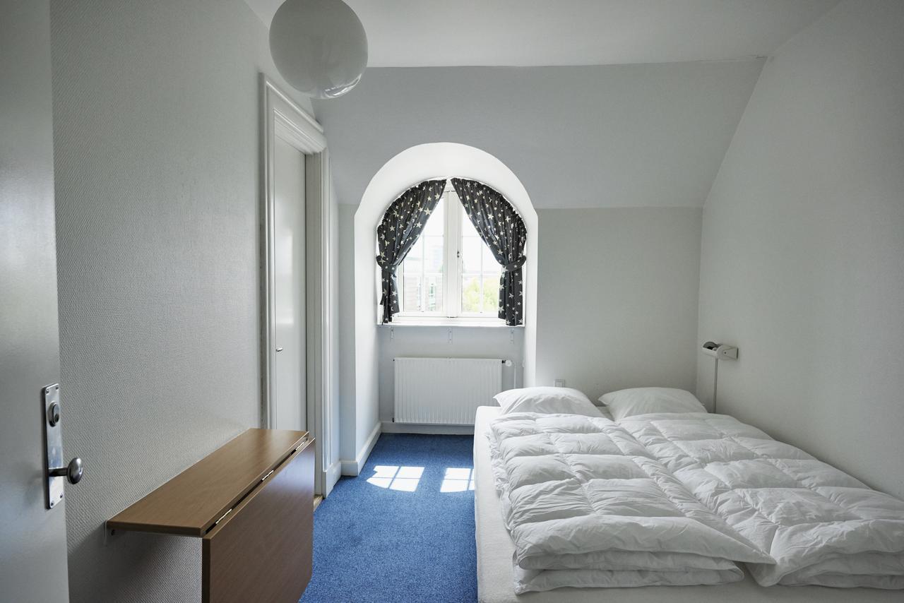 Danhostel Odense City المظهر الخارجي الصورة A bedroom at the hotel