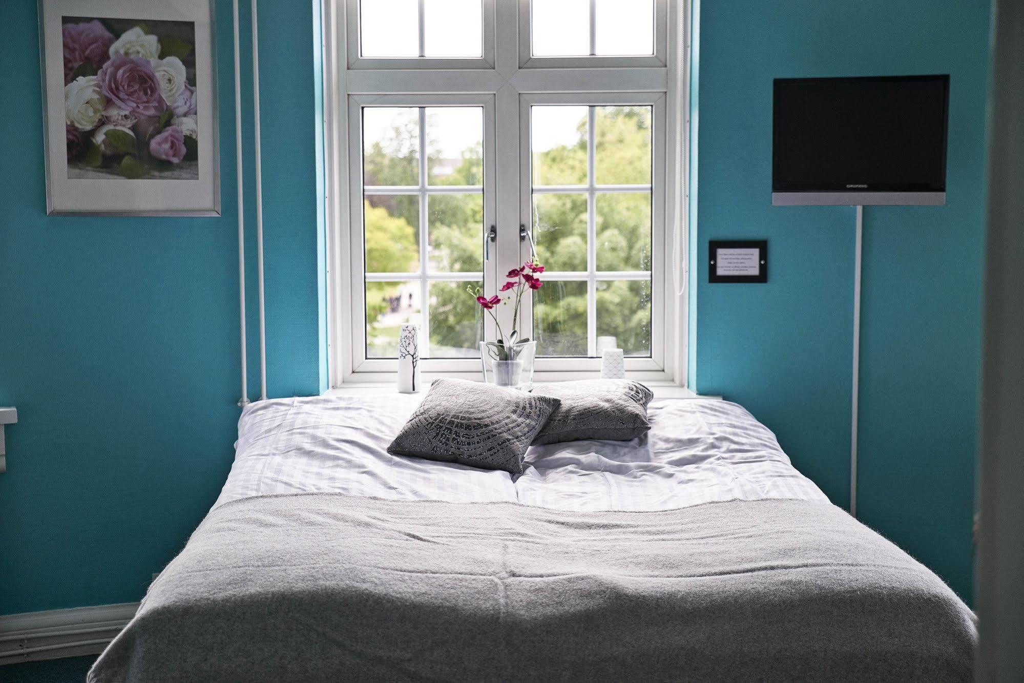 Danhostel Odense City المظهر الخارجي الصورة A bedroom