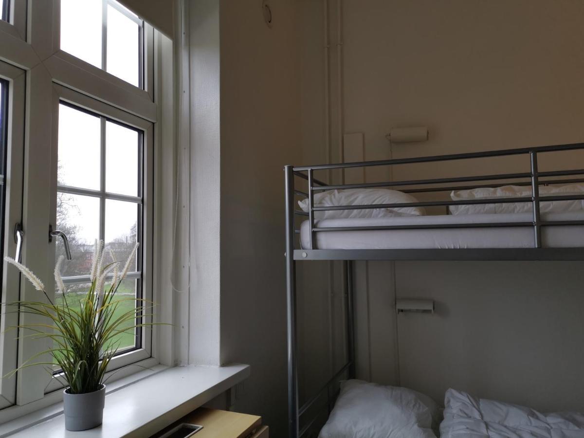 Danhostel Odense City المظهر الخارجي الصورة A room at the hostel